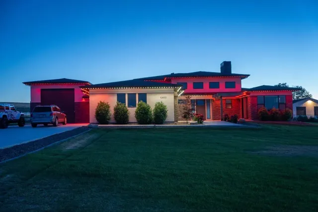 Game-day team-color lighting on a home